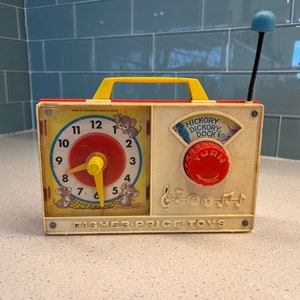 Fisher Price No. 107 - Music Box Clock Radio - 1971