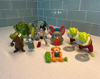 Giocattoli Happy Meal di McDonald's e Burger King: Astro Boy, Narnia, Furby, Ben 10