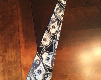 Men’s novelty tie: 50 and 100 US dollars