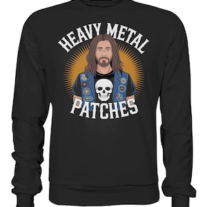 May include: Black sweatshirt with a graphic of a man with long brown hair and a beard, wearing a denim jacket with patches and a skull t-shirt. The text "HEAVY METAL PATCHES" is arched above the image.