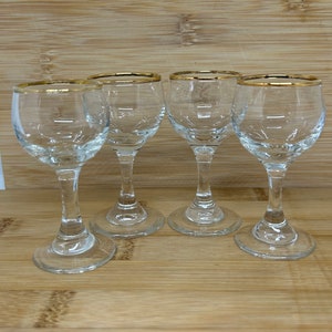 Juego de 4 vasos de chupito vintage con ribete dorado