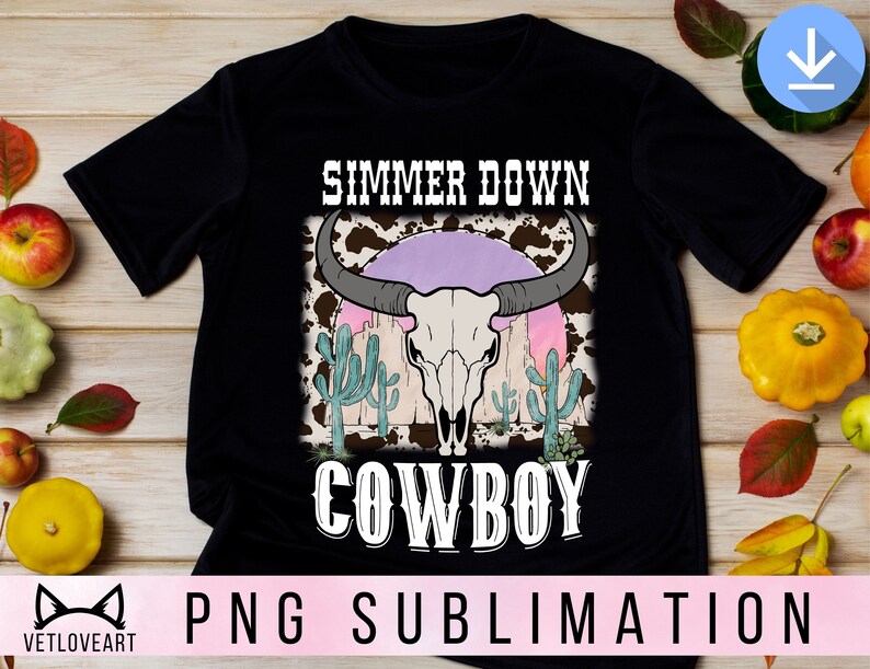 May include: Black t-shirt with a white graphic design of a cow skull with cacti and the text "Summer Down Cowboy".