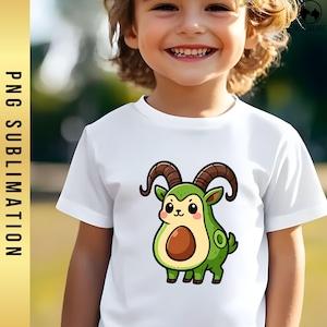 May include: White t-shirt featuring a cartoon avocado-goat hybrid character with brown horns and a brown pit. The design is green and brown with black outlines. The text "PNG SUBLIMATION" is on the left side of the image.
