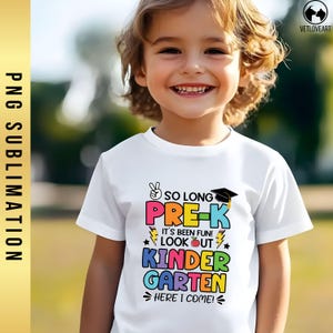 May include: A white t-shirt with a colorful graphic that says "So Long Pre-K It's Been Fun! Look Out Kindergarten Here I Come!"