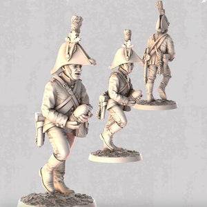 May include: Three miniature figurines of soldiers wearing white uniforms and hats with feathers. Each soldier is holding a small white ball in their hands. The figurines are standing on round bases.