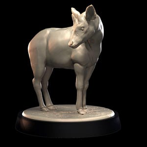 Pode incluir: Uma escultura de cor bege claro com superfície lisa de um saola em pé sobre uma base circular. O animal é retratado de perfil com a cabeça voltada para o observador, apresentando dois chifres retos e finos e marcas faciais distintas.
