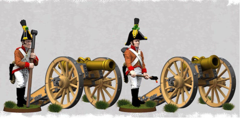 May include: Two miniature figures of soldiers in red and white uniforms, holding muskets, stand next to a wooden cannon with gold accents. The cannon is on wheels and has a black carriage.