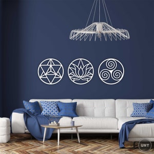 May include: Three white metal wall decor pieces in the shape of circles with different geometric designs. The designs include a star, a lotus flower, and a triskelion. The decor is hanging on a dark blue wall in a living room setting.