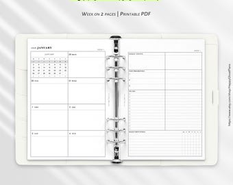 May include: A 2026 weekly planner in A5 size, measuring 5.85 by 8.27 inches. The open binder displays a two-page layout with a January calendar, daily schedule sections, goal tracking, top priorities, a to-do list, and daily routines.