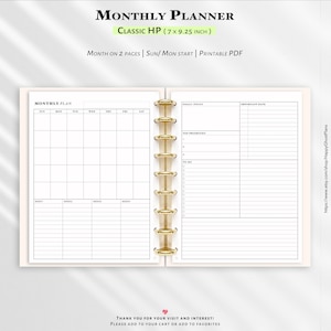May include: Open monthly planner with a gold spiral binding. The planner is labelled "Monthly Planner" and "Classic HP (17.8 x 23.5 cm)". The pages are blank with sections for goals, priorities, and to-do lists. The planner is designed to be printed.