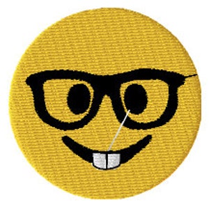 May include: Yellow smiley face with black glasses and a single tooth sticking out. The smiley face has a small black needle sticking out of its right eye.