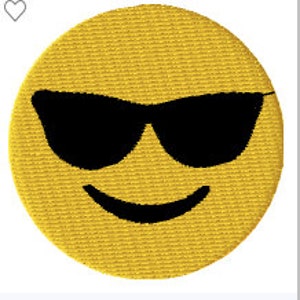 May include: Yellow smiley face emoji with black sunglasses. The emoji has a simple black smile.