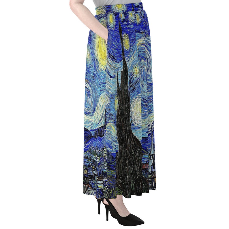May include: A long blue skirt with a print of Vincent van Gogh's "The Starry Night". The skirt has a waistband and a pocket on the side.
