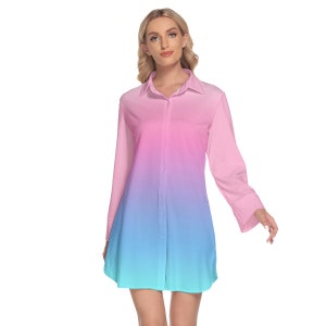 May include: A long-sleeved button-down shirt with a gradient ombre design in shades of pink, blue, and turquoise.
