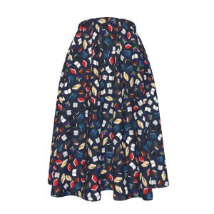 May include: A navy blue midi skirt with a print of colourful books. The skirt has a gathered waist and a flared silhouette.