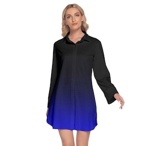 May include: A long-sleeved shirt with a black to blue ombre design. The shirt has a button-up front and a collared neckline.