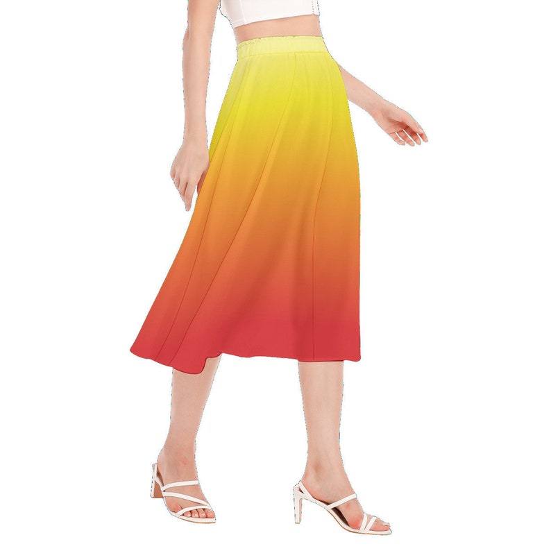 May include: A yellow, orange, and red ombre midi skirt with a high waist and a flowy silhouette.