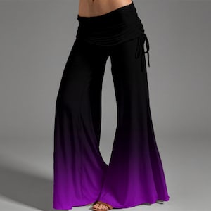 May include: Black and purple ombre palazzo pants. The pants have a high waist with a ruched design and drawstring detail. The wide legs transition from black at the top to a vibrant purple at the hem, creating a striking visual effect. The pants are made of a soft, flowing fabric.