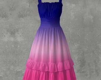 Vestido de mujer con bajo con volantes, en tonos azul marino y rosa degradado.