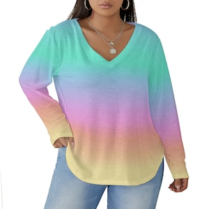May include: A long-sleeved, V-neck shirt with a rainbow ombre design. The shirt is a light blue color at the top and fades to yellow at the bottom.