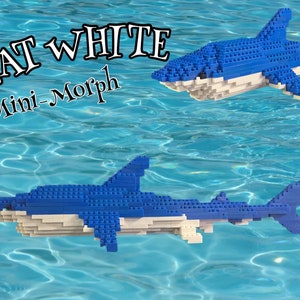 May include: Two blue and white Great White shark models made of Lego bricks. The text "GREAT WHITE Mini-Morph" is in the upper left corner of the image.