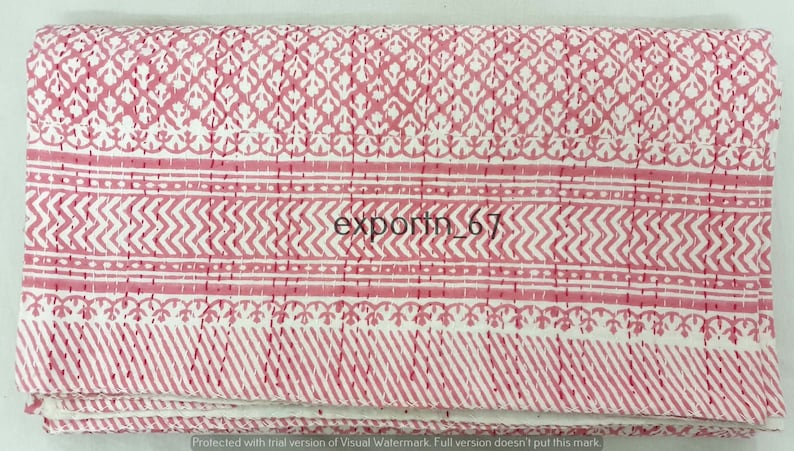 May include: Pink and white cotton fabric with a repeating geometric pattern. The fabric is folded and has a watermark that says "export_67".