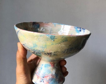 Bowl with multicolored foot