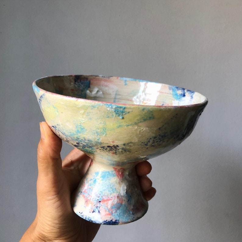 Bowl with multicolored foot A