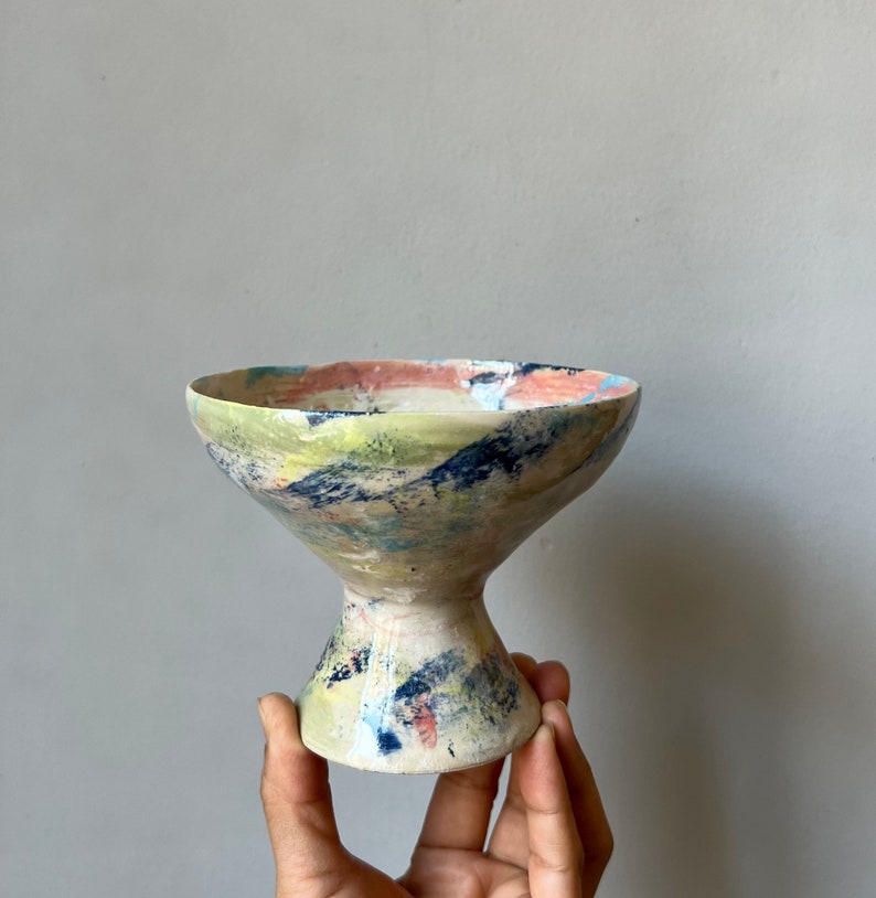 Bowl with multicolored foot C