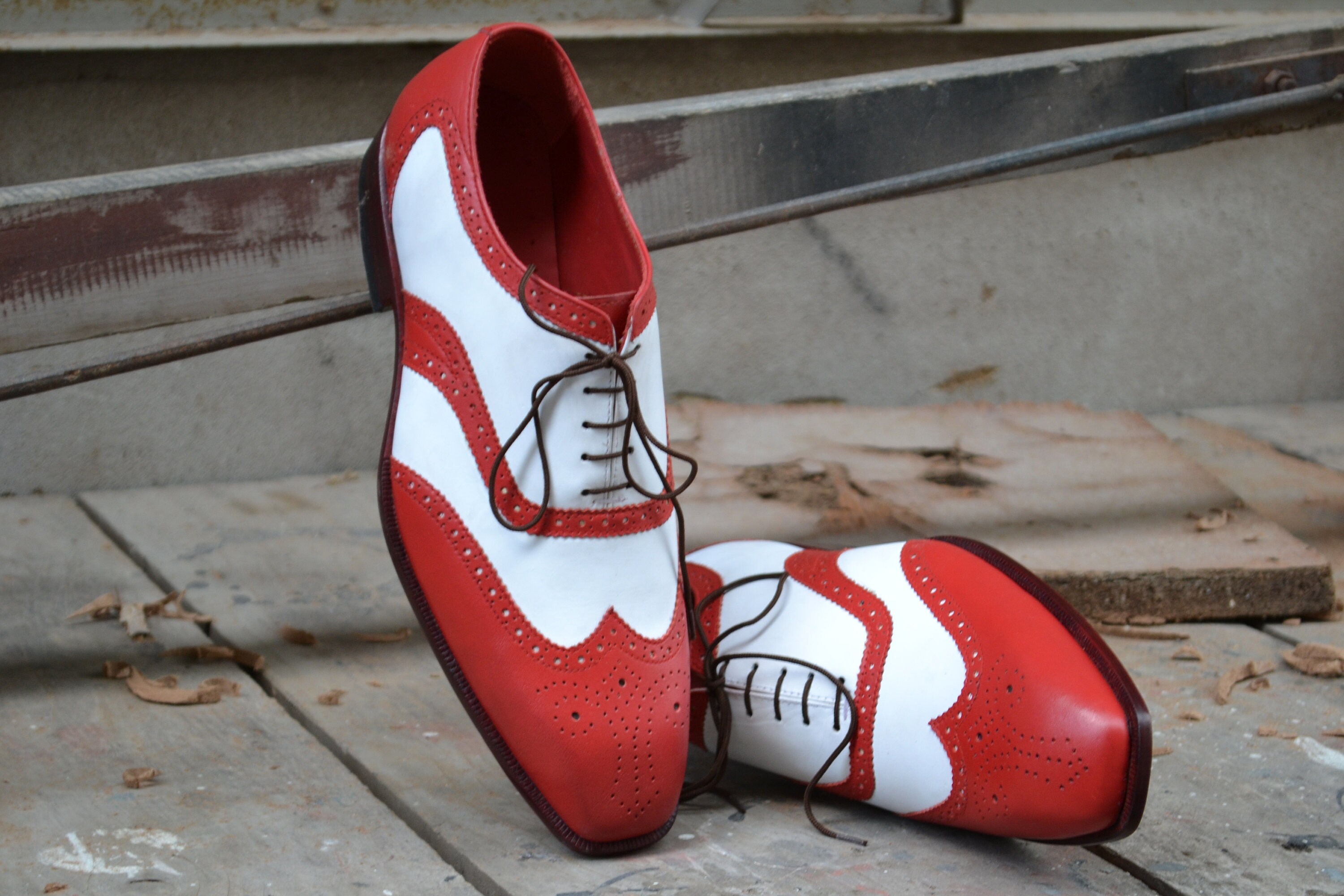Red and white wingtip best sale shoes