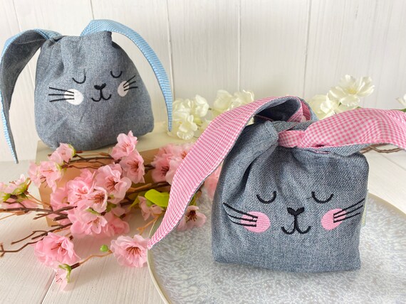Easter basket bunnies made of fabric with cute ears