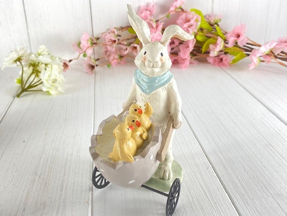 Easter decoration bunnies with wheelbarrow