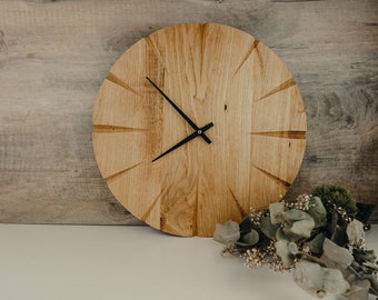 round wall clock made of oak
