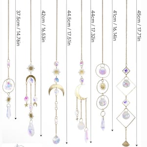 May include: Set of 6 gold celestial sun and moon hanging ornaments with iridescent crystal beads and charms. The ornaments range in length from 14.76 inches to 17.71 inches.