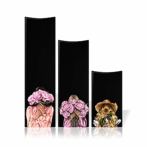 May include: Three women with their faces hidden behind flowers. The woman on the left is holding pink peonies, the woman in the middle is holding pink peonies, and the woman on the right is holding a sunflower.