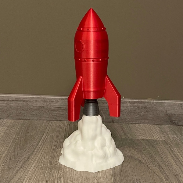 Retro raket met pluimuitlaat (decoratie of speelgoed)