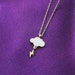 see more listings in the 14K Gold-Silver Necklace section
