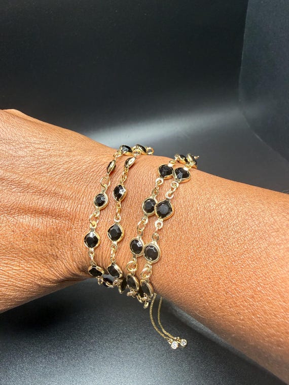 Black and Gold 4 Strand Beaded Bracelet with Sliding Adjustable Closure