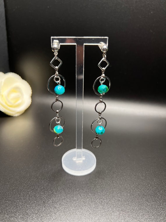 Circles with Multi Green Glass Beads Posts