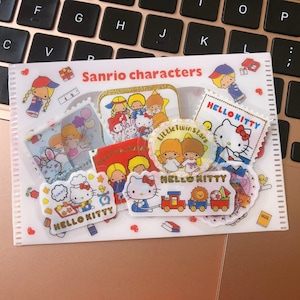 Premium 45 Stück Sanrio Familie Charaktere Aufkleber Flocken Tasche, meine Melodie, Purin, Pochacco, Cinnamonroll, Tuxedo Sam, Aufkleberpaket, snoopy