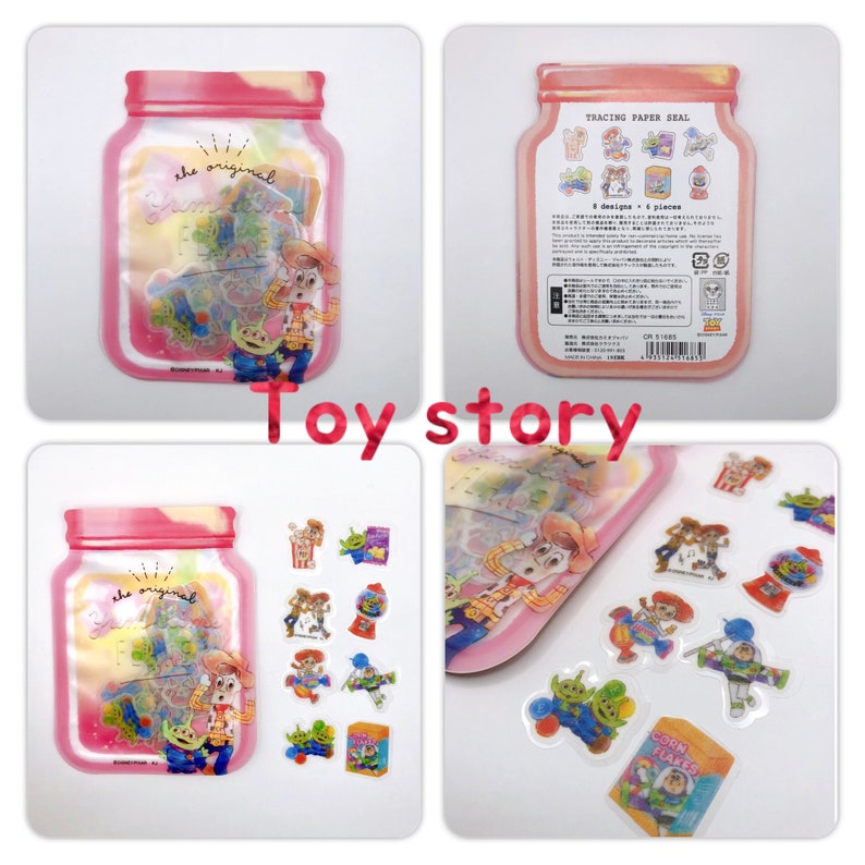 May include: A set of 8 Toy Story themed stickers in a clear plastic jar with a pink lid. The stickers feature characters from the movie, including Woody, Buzz Lightyear, and the aliens. The jar has the text "the original" on it.
