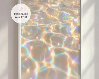 May include: A framed print featuring an abstract image of water with light reflections. The water's surface shimmers with gold, yellow, and rainbow hues. The text "Personalise Your Print" is on a white circle in the upper left corner.