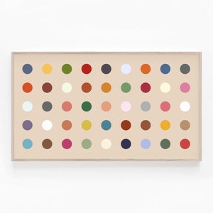 May include: A framed artwork featuring a grid of 64 colorful circles in various shades of red, blue, green, yellow, brown, pink, and white. The circles are arranged in a grid pattern on a beige background.