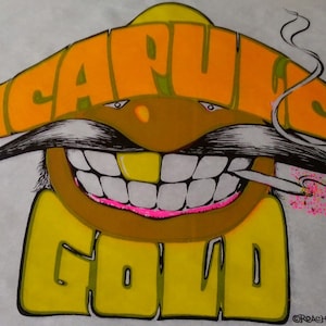 May include: A yellow and orange cartoon illustration of a smiling face with a large mustache and a cigarette in its mouth. The face is wearing a sombrero and the text "ACAPULCO GOLD" is written around the face.