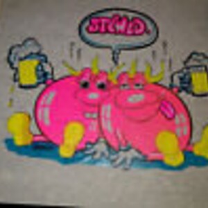 May include: Two pink cartoon bulls with horns, wearing yellow shoes, holding beer mugs, and sitting in a pool of blue water. The bulls are smiling and have a speech bubble above them that says "Cheers".