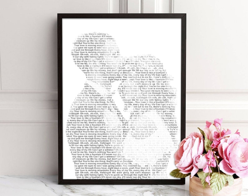 May include: Black and white typography art print featuring a silhouette of a person with the lyrics "Your love is like a fountain it'll never run dry" repeated throughout the design.