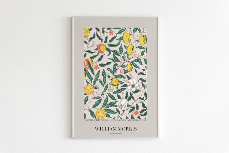 May include: A framed poster featuring a vintage floral pattern with a pink background, green leaves, yellow lemons, and red flowers. The poster is titled "William Morris" and includes the text "VICTORIA & ALBERT MUSEUM, WITH ACKNOWLEDGEMENT, ART AND CRAFTS, 1883".
