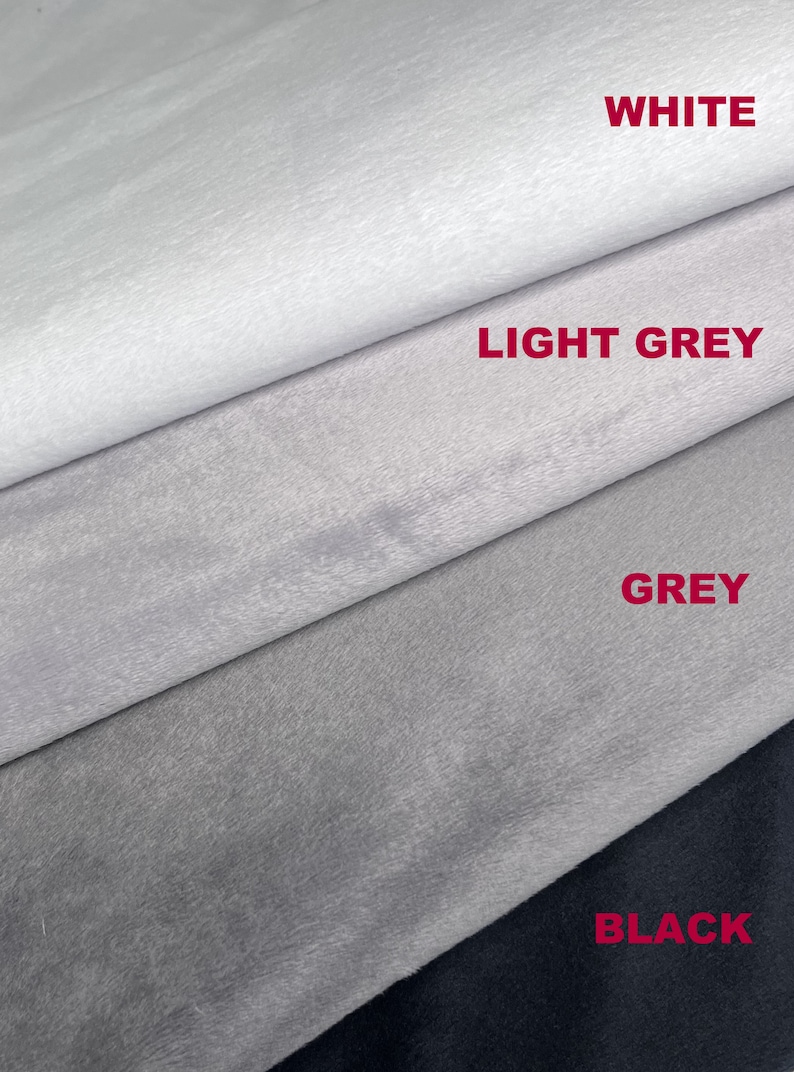 Puede incluir: Primer plano de muestras de tela en blanco, gris claro, gris y negro. El texto "WHITE", "LIGHT GREY", "GREY" y "BLACK" se muestra en la imagen. Las telas parecen suaves y texturizadas.