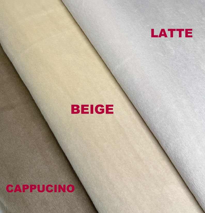Op de afbeelding: Drie stofstalen in verschillende beige tinten: cappuccino, beige en latte.