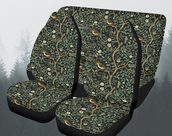 May include: Set of four car seat covers featuring a floral pattern with birds and leaves on a dark green background. The covers have black edging.